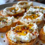 Sweet and Spicy Whipped Feta Crostini with Hot Honey Magic